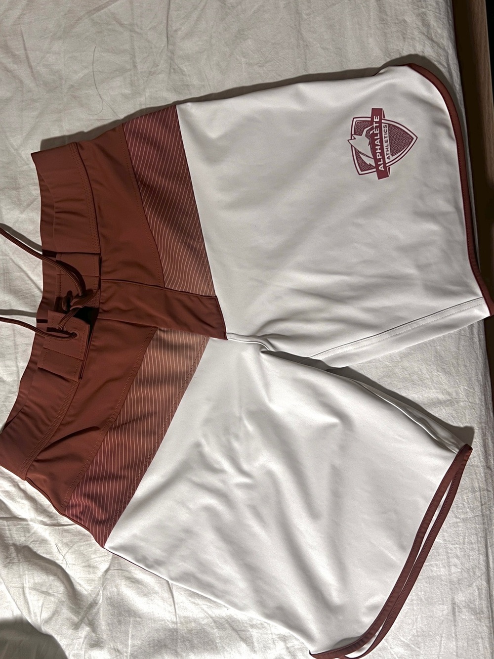 Alphalete mens White & Rust Two-Tone Performance Shorts